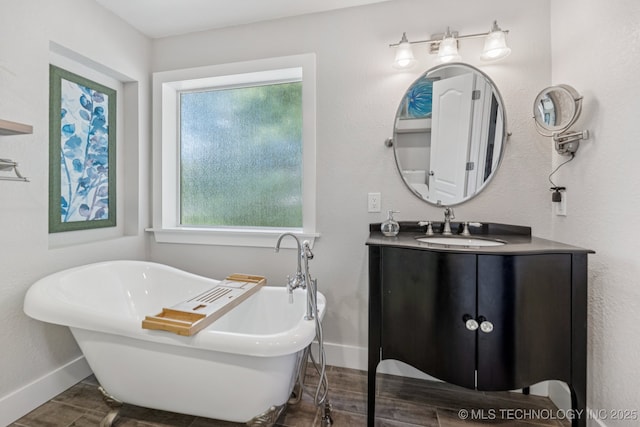 200 N Redwood Ct, Broken Arrow, OK 74012 - full bathroom with vanity, a soaking tub, and wood finished floors
