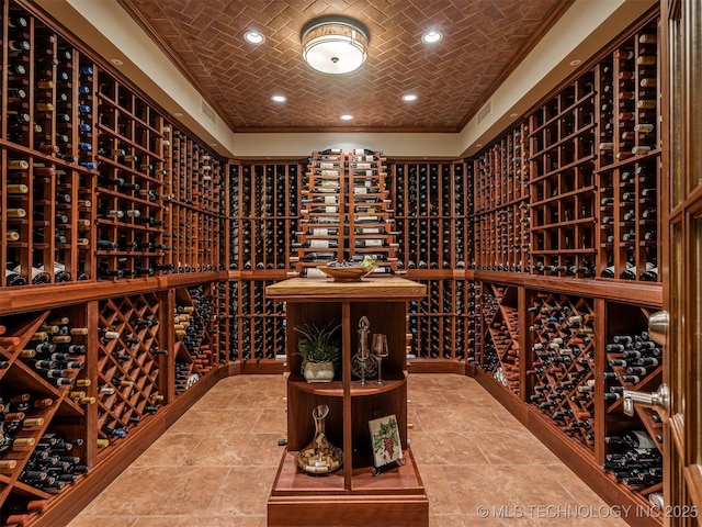 34159 E 698th Rd, Wagoner, OK 74467 - wine area featuring stone tile floors, crown molding, and recessed lighting