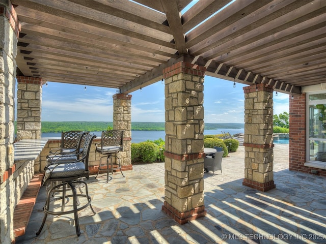 34159 E 698th Rd, Wagoner, OK 74467 - view of patio featuring a water view