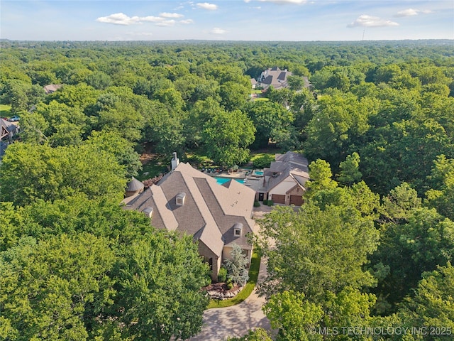 19735 E Woodhaven Rd, Owasso, OK 74055 - aerial view of property and surrounding area featuring a forest