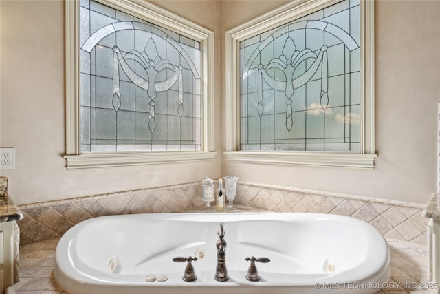 19735 E Woodhaven Rd, Owasso, OK 74055 - bathroom with a whirlpool tub