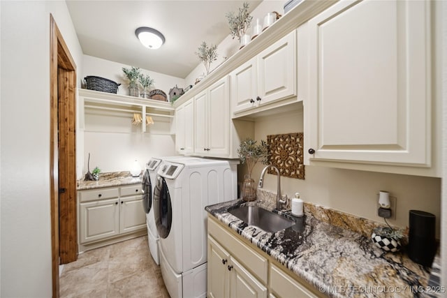 19735 E Woodhaven Rd, Owasso, OK 74055 - washroom featuring washing machine and clothes dryer, cabinet space, and light tile patterned floors