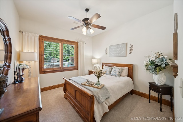 19735 E Woodhaven Rd, Owasso, OK 74055 - bedroom with light colored carpet and a ceiling fan