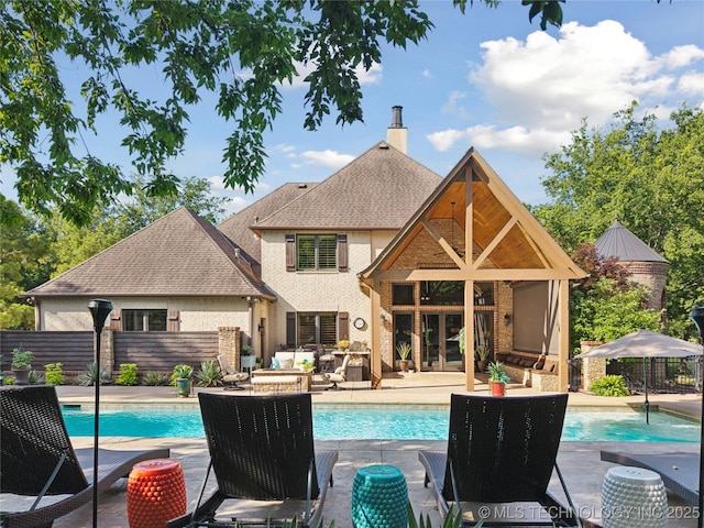19735 E Woodhaven Rd, Owasso, OK 74055 - view of swimming pool with a patio area and french doors