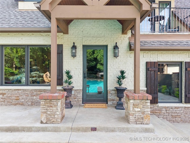 19735 E Woodhaven Rd, Owasso, OK 74055 - entrance to property with a balcony and a shingled roof