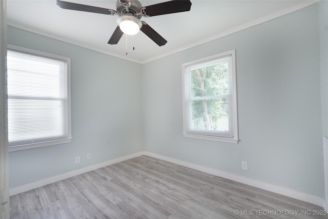 6240 E Latimer Pl, Tulsa, OK 74115 - unfurnished room featuring wood finished floors, crown molding, and a ceiling fan