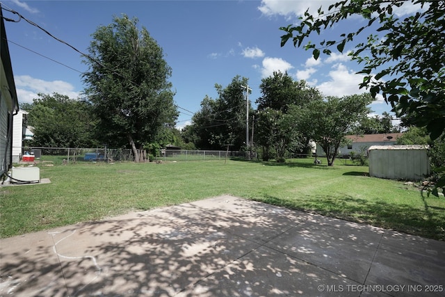 6240 E Latimer Pl, Tulsa, OK 74115 - fenced backyard featuring a patio