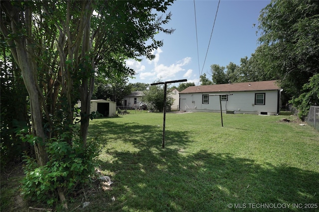 6240 E Latimer Pl, Tulsa, OK 74115 - view of yard featuring a shed