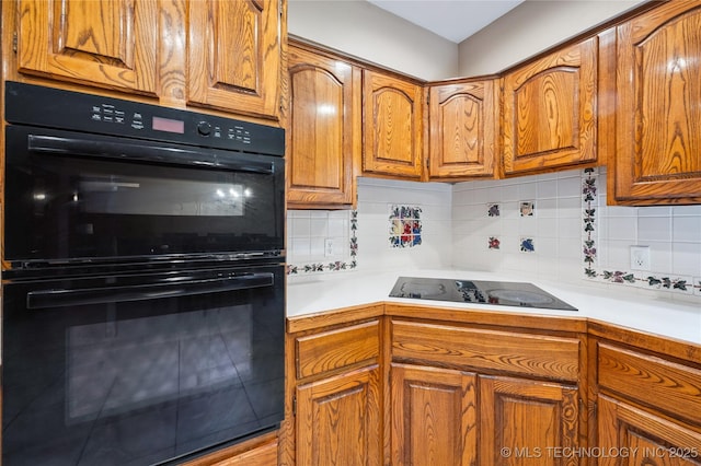 7222 E 87th St, Tulsa, OK 74133 - kitchen with black appliances, brown cabinets, tasteful backsplash, and light countertops