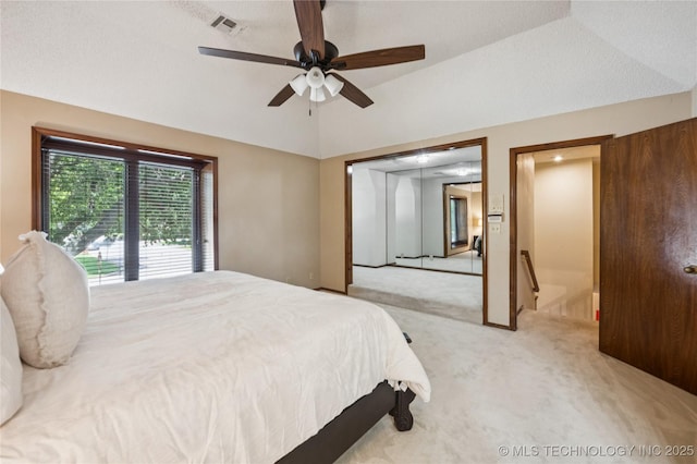 7222 E 87th St, Tulsa, OK 74133 - bedroom featuring carpet floors, vaulted ceiling, and a ceiling fan