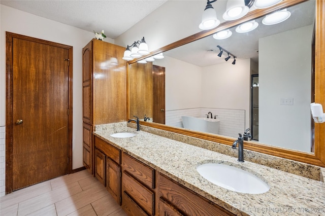 7222 E 87th St, Tulsa, OK 74133 - bathroom with double vanity and a freestanding bath