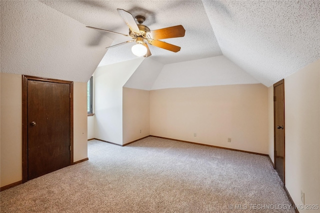 7222 E 87th St, Tulsa, OK 74133 - bonus room featuring light colored carpet, a textured ceiling, vaulted ceiling, and a ceiling fan