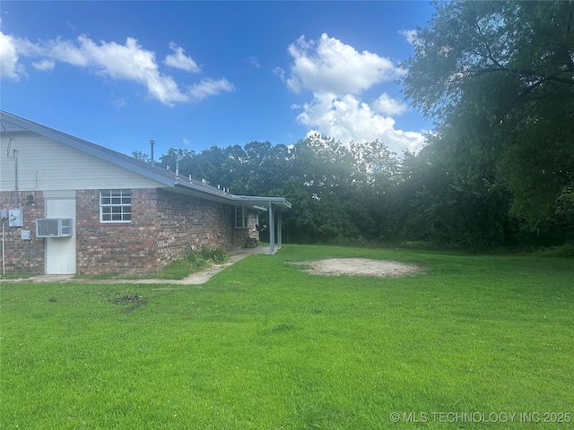 282 Westland Rd, Sapulpa, OK 74066 - view of green lawn with a wall mounted AC