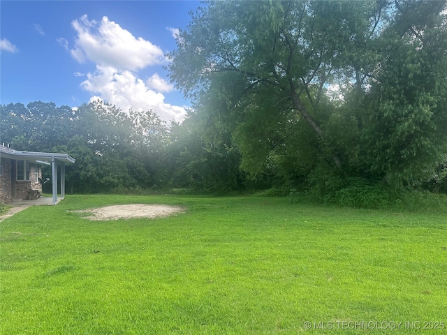 282 Westland Rd, Sapulpa, OK 74066 - view of grassy yard with a patio