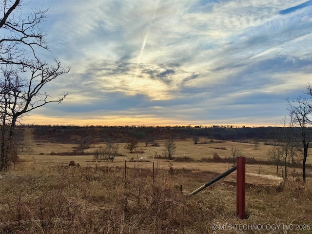 105148 S 4500, Vian, OK 74962 - yard at dusk with a rural view