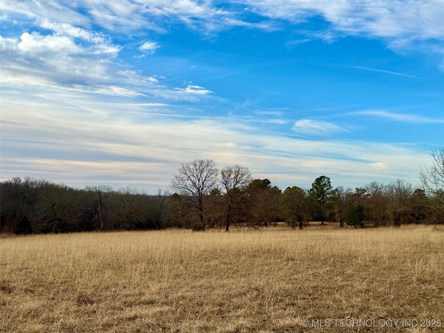 105148 S 4500, Vian, OK 74962 - view of tree filled area featuring a view of rural / pastoral area