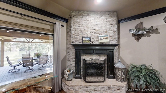 6166 Hedges St, Ardmore, OK 73401 - detailed view of a stone fireplace and crown molding