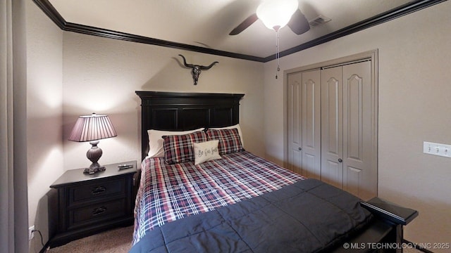 6166 Hedges St, Ardmore, OK 73401 - carpeted bedroom featuring crown molding, a closet, and ceiling fan
