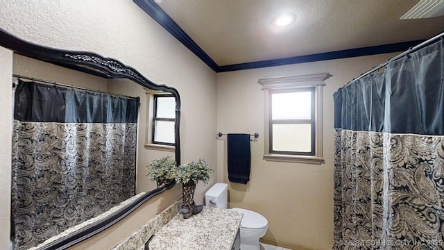 6166 Hedges St, Ardmore, OK 73401 - bathroom featuring ornamental molding, vanity, a textured wall, a shower with curtain, and a textured ceiling