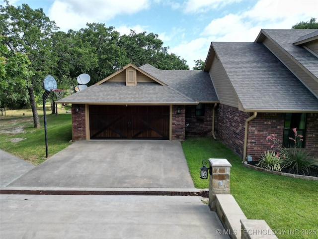 6166 Hedges St, Ardmore, OK 73401 - view of front of home with brick siding, a front yard, an attached garage, and a shingled roof
