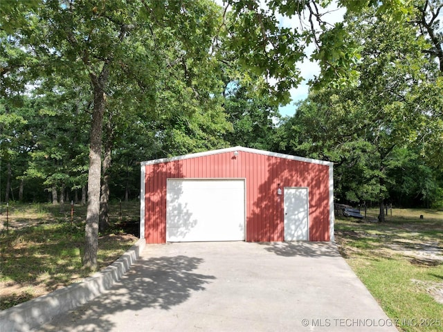 6166 Hedges St, Ardmore, OK 73401 - view of outdoor structure with concrete driveway