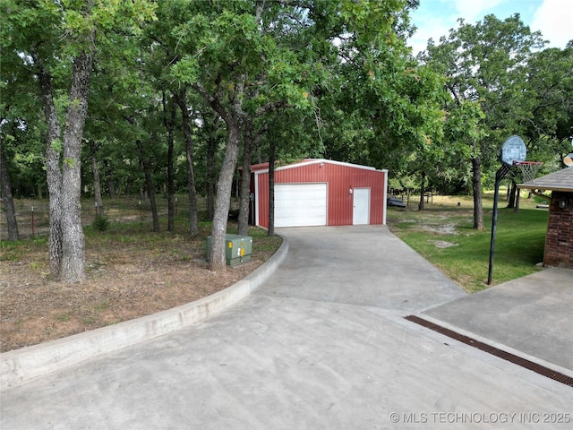 6166 Hedges St, Ardmore, OK 73401 - detached garage with concrete driveway