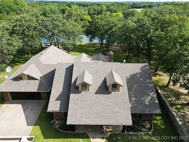 6166 Hedges St, Ardmore, OK 73401 - view of subject property with a heavily wooded area