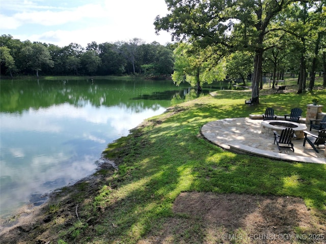 6166 Hedges St, Ardmore, OK 73401 - water view featuring an outdoor fire pit