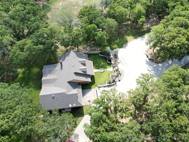 6166 Hedges St, Ardmore, OK 73401 - view of subject property featuring a heavily wooded area