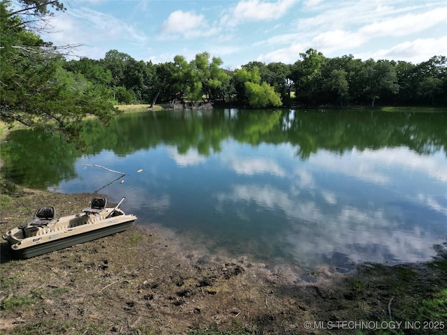 6166 Hedges St, Ardmore, OK 73401 - water view with a heavily wooded area