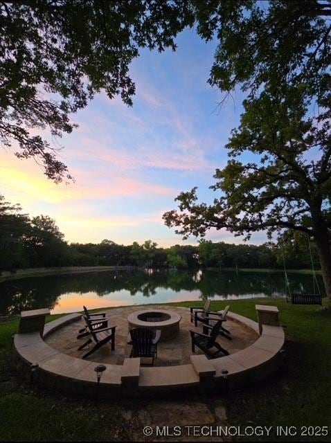 6166 Hedges St, Ardmore, OK 73401 - view of property's community featuring a water view and an outdoor fire pit