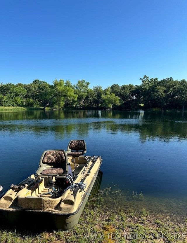 6166 Hedges St, Ardmore, OK 73401 - dock featuring a water view