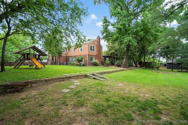 213 Moccasin Ln, Sapulpa, OK 74066 - view of yard featuring a playground