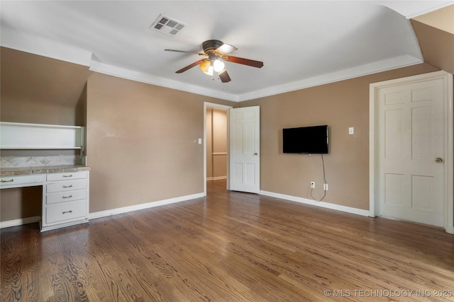 213 Moccasin Ln, Sapulpa, OK 74066 - unfurnished living room with a ceiling fan, dark wood-style floors, and built in study area