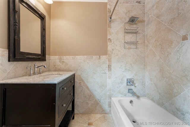 213 Moccasin Ln, Sapulpa, OK 74066 - full bathroom with vanity and tile walls