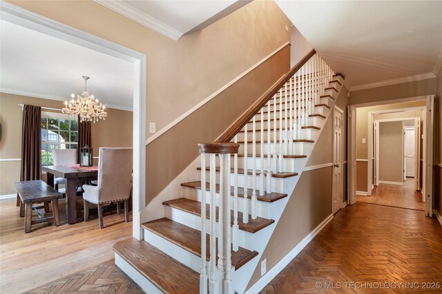 213 Moccasin Ln, Sapulpa, OK 74066 - staircase featuring a chandelier and ornamental molding