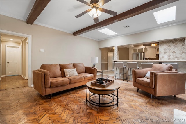 213 Moccasin Ln, Sapulpa, OK 74066 - living room with a skylight, beam ceiling, and ceiling fan