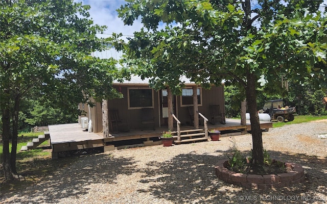 181103 W Sherman Rd, Moyers, OK 74557 - view of front facade featuring a deck