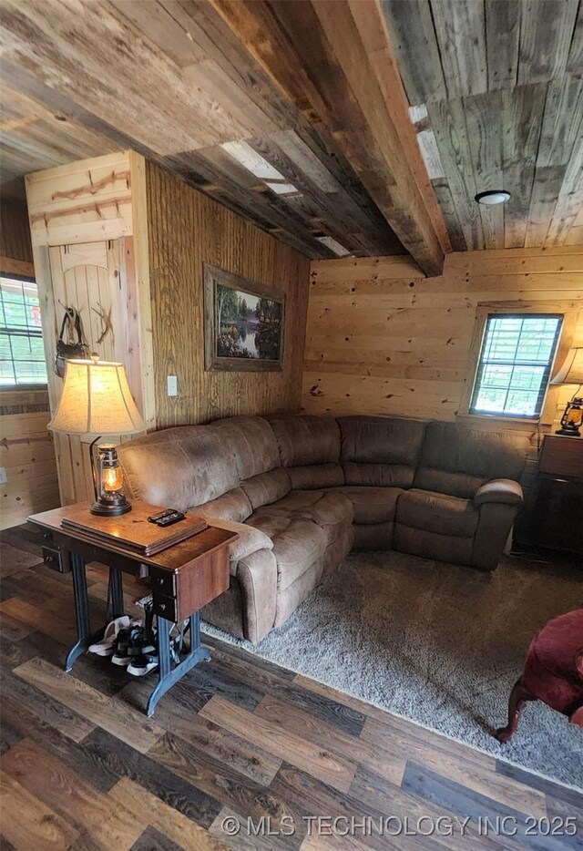 181103 W Sherman Rd, Moyers, OK 74557 - living room featuring wood walls, a wood ceiling with exposed beams, and wood finished floors