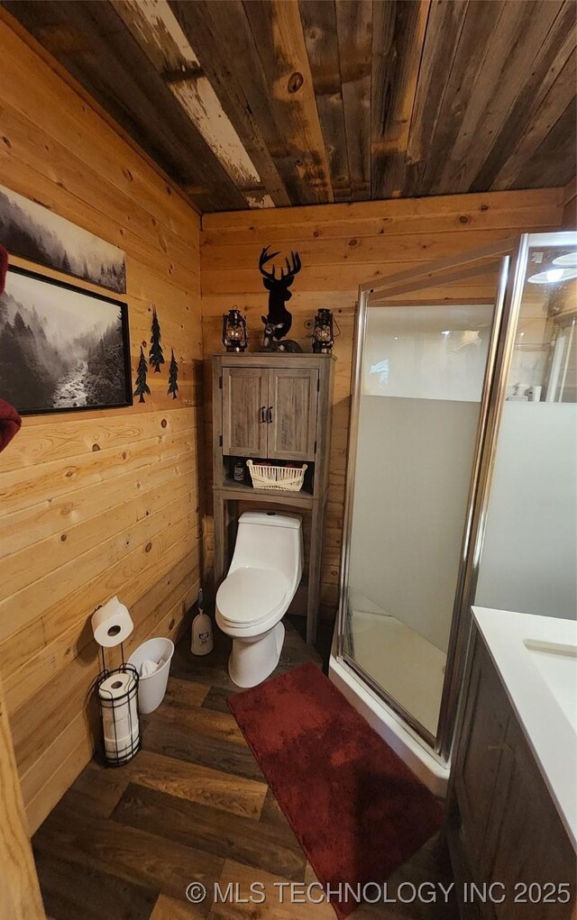 181103 W Sherman Rd, Moyers, OK 74557 - full bath featuring wood ceiling, wood walls, a shower stall, wood finished floors, and vanity
