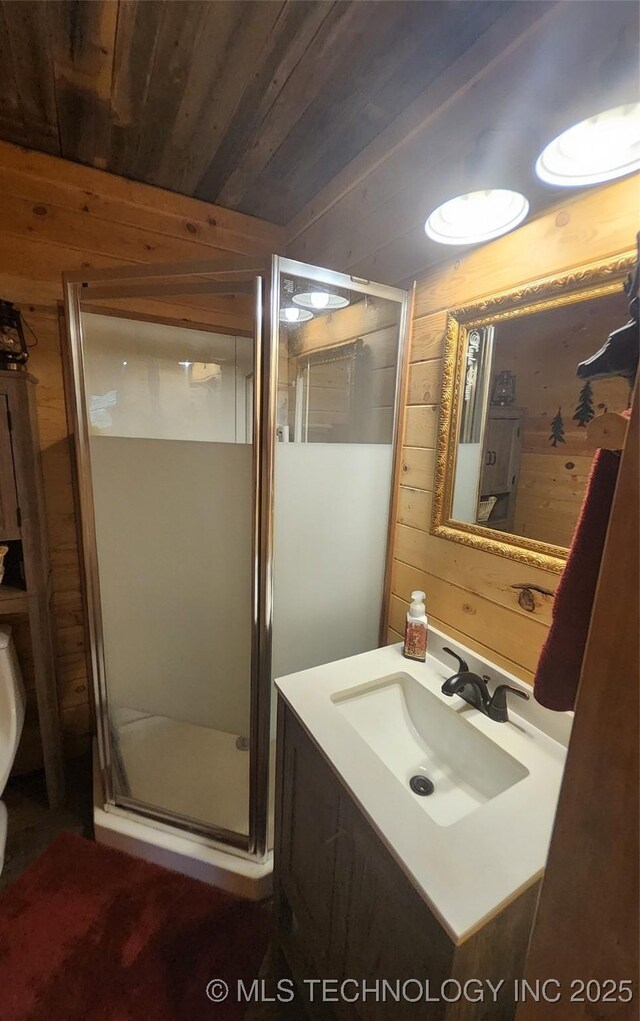 181103 W Sherman Rd, Moyers, OK 74557 - bathroom featuring wooden walls, vanity, a shower stall, and wooden ceiling