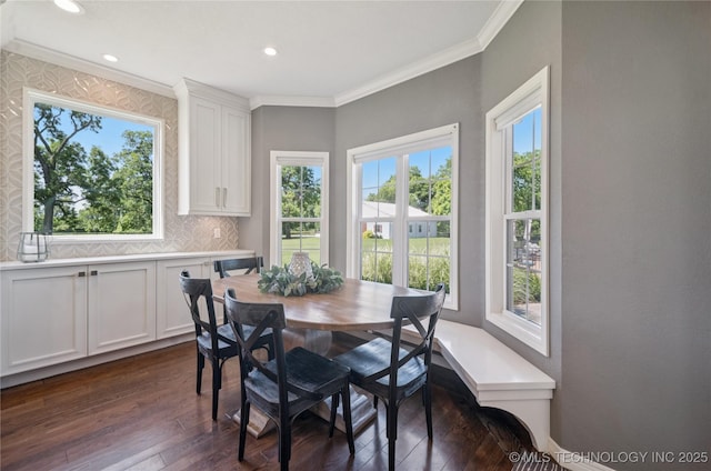 12828 S Mingo Rd, Bixby, OK 74008 - dining space with dark wood-style flooring, ornamental molding, and recessed lighting