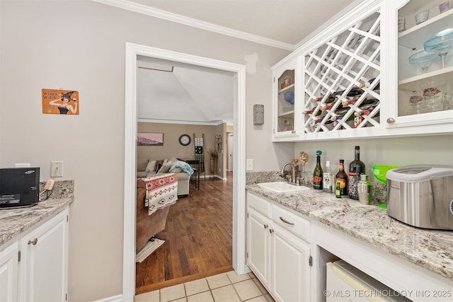 33922 S 4240th Rd, Inola, OK 74036 - indoor bar with ornamental molding, vaulted ceiling, and light tile patterned floors