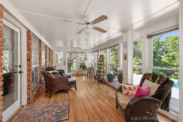 33922 S 4240th Rd, Inola, OK 74036 - sunroom / solarium with a ceiling fan, wood finished floors, and plenty of natural light
