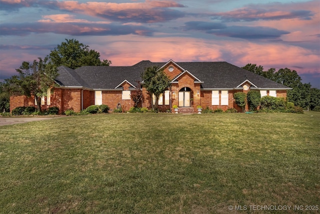 33922 S 4240th Rd, Inola, OK 74036 - view of front of property with a lawn and brick siding