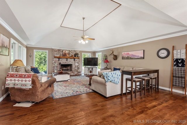 33922 S 4240th Rd, Inola, OK 74036 - living room featuring vaulted ceiling, wood finished floors, ceiling fan, a fireplace, and ornamental molding