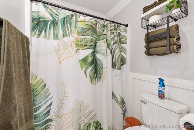 33922 S 4240th Rd, Inola, OK 74036 - bathroom with ornamental molding, wainscoting, curtained shower, and a decorative wall