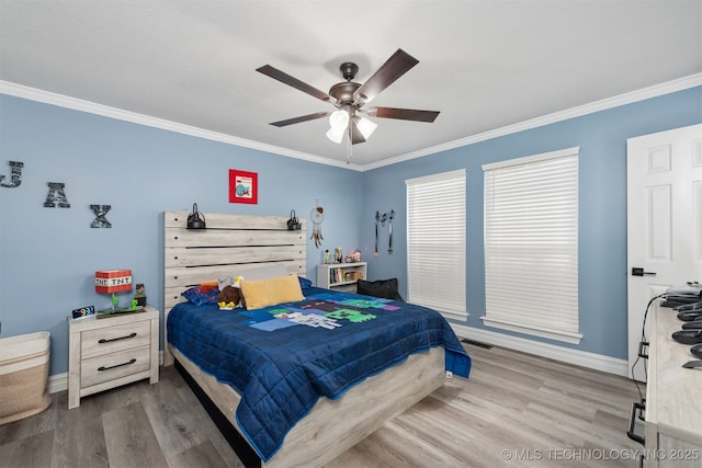 33922 S 4240th Rd, Inola, OK 74036 - bedroom with wood finished floors, ornamental molding, and a ceiling fan