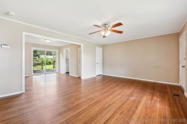 1422 E 52nd St, Tulsa, OK 74105 - spare room with a ceiling fan, a smoke detector, wood finished floors, and crown molding