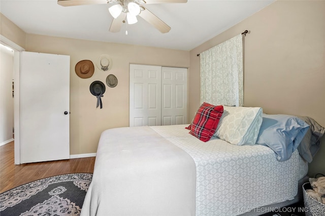 3926 E 51st Pl, Tulsa, OK 74135 - bedroom with wood finished floors, a closet, and ceiling fan